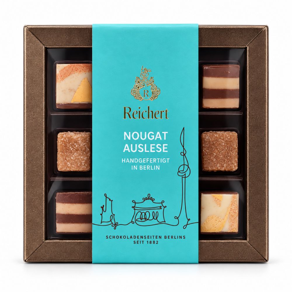 Reichert Nougat-Auslese mit neun Pralinen in einer türkisfarbenen Geschenkverpackung