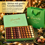 Sawade Pralinen- und Trüffel-Kartonage und grüne Geschenkbeutel, mit Schokolade-Arrangement